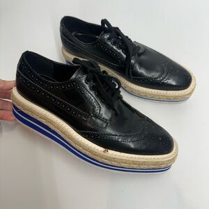 PRADA BROGUE TRIM LEATHER OXFORD SHOES